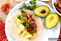 Smoky Pulled Pork Breakfast Tacos with Tangy Slaw
