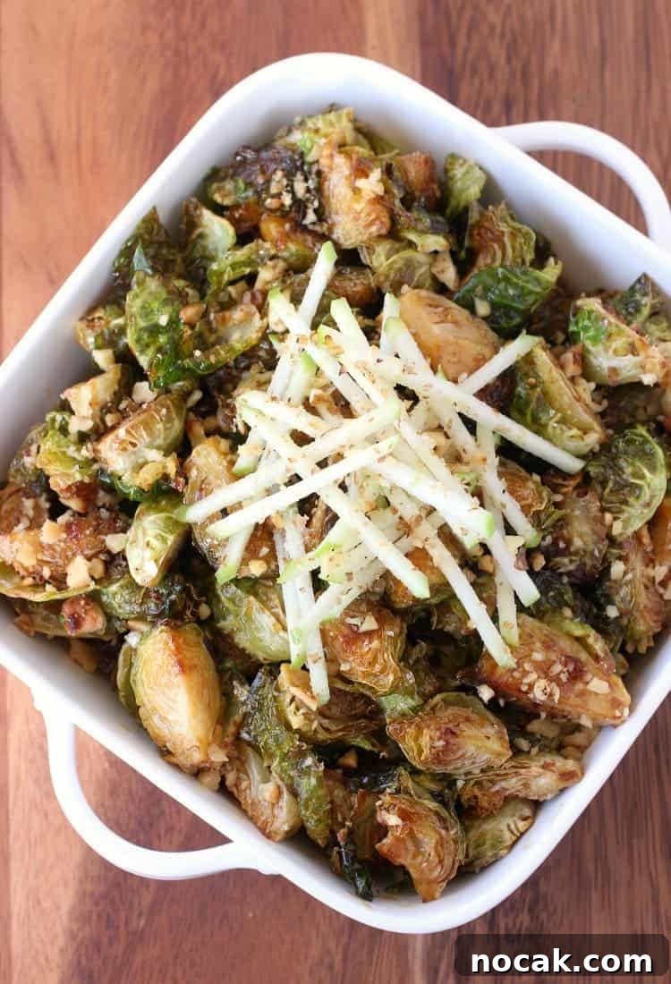 Whiskey Glazed Brussels Sprouts is the side dish you've been looking for! Fried brussels sprouts tossed in our famous whiskey glaze! Make these Fried Whiskey Glazed Brussels Sprouts for your Thanksgiving dinner!