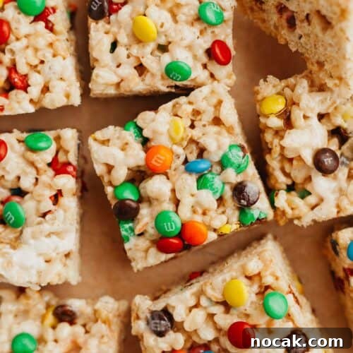 m&m rice krispie treats on parchment paper.