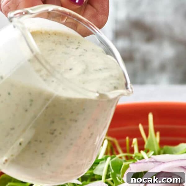 Crispy Breaded Chicken Cutlets: Step-by-Step Coating Guide 11 Homemade ranch dressing in small pitcher.