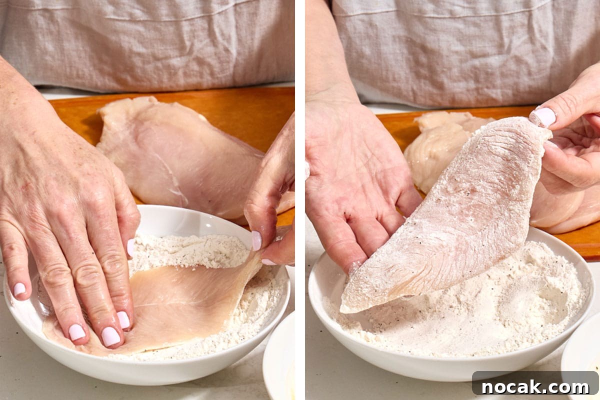 Crispy Breaded Chicken Cutlets: Step-by-Step Coating Guide 5 Woman dredging chicken cutlet in seasoned flour.