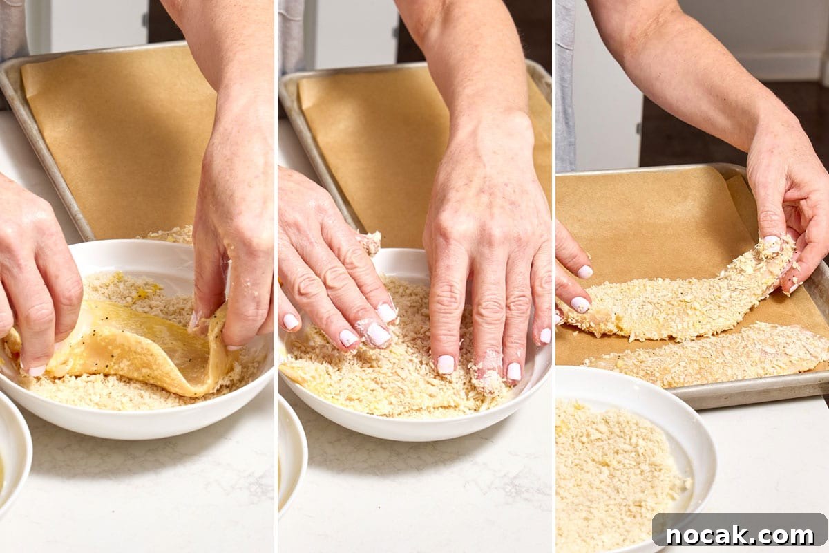 Crispy Breaded Chicken Cutlets: Step-by-Step Coating Guide 7 Woman breading chicken cutlet with panko breadcrumbs.