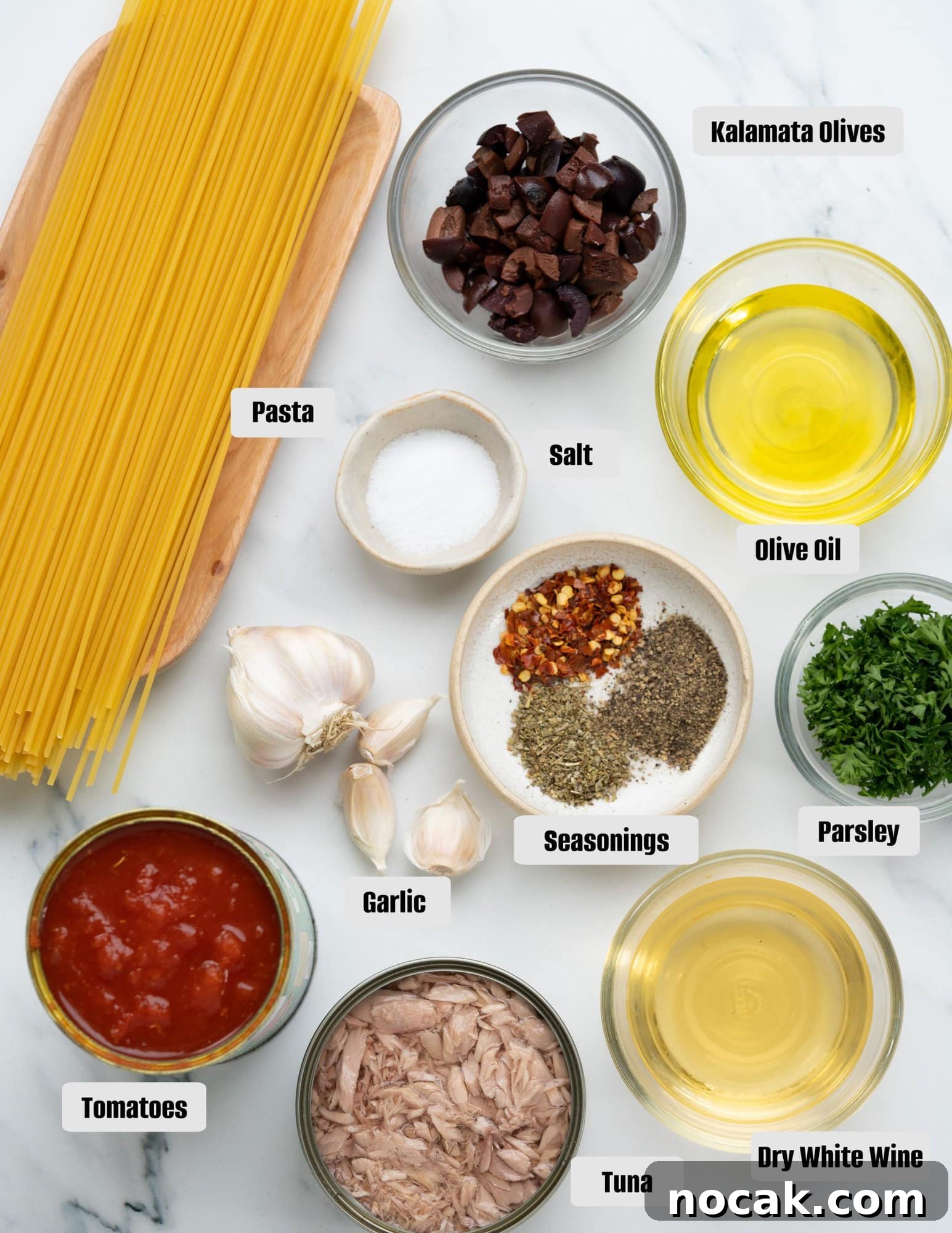 Ingredients - Spaghetti, Tuna, Tomatoes, Kalamata olives, olive oil, white wine, parsley, garlic and seasonings.