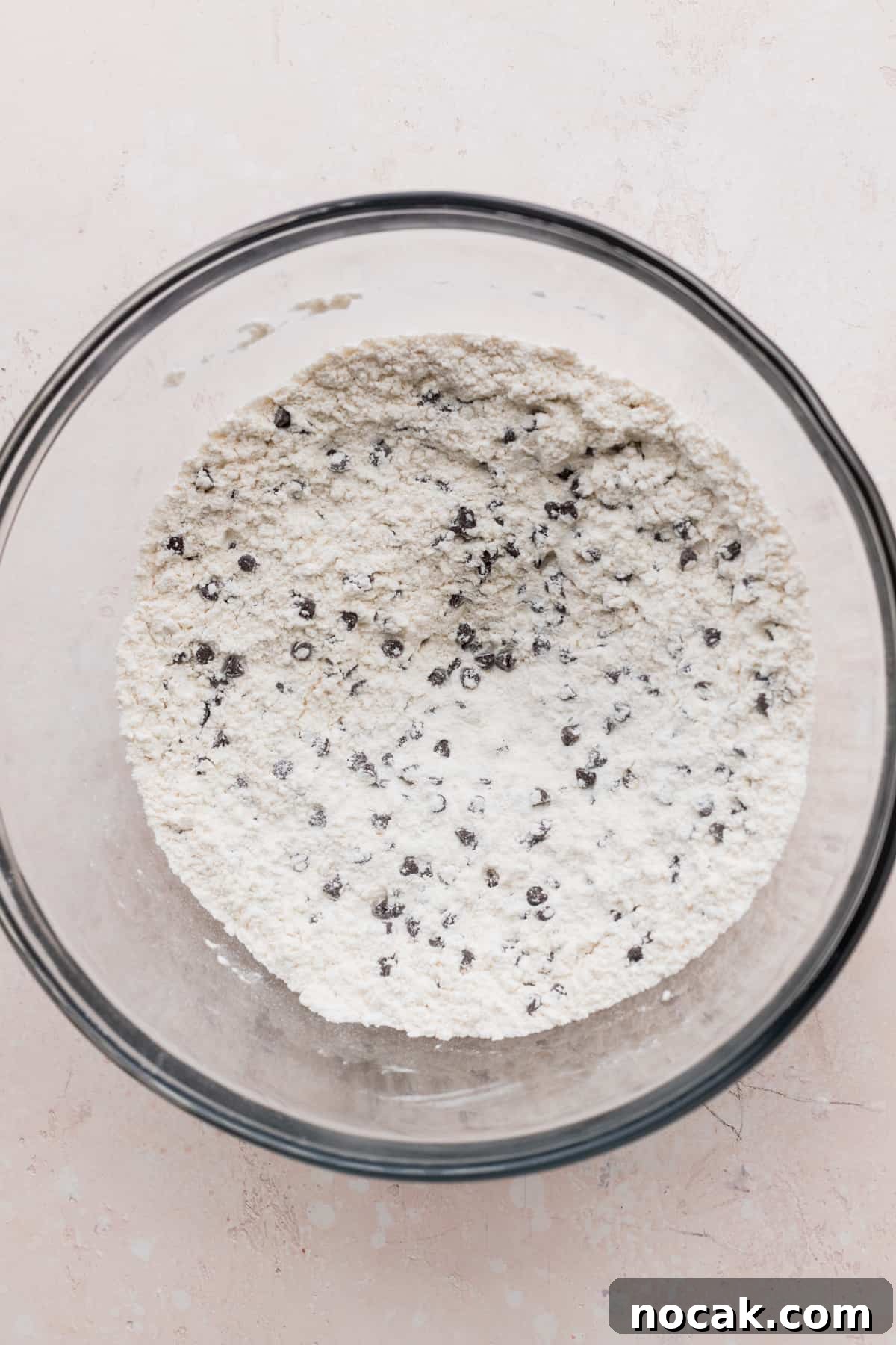Dry ingredients in a glass bowl.