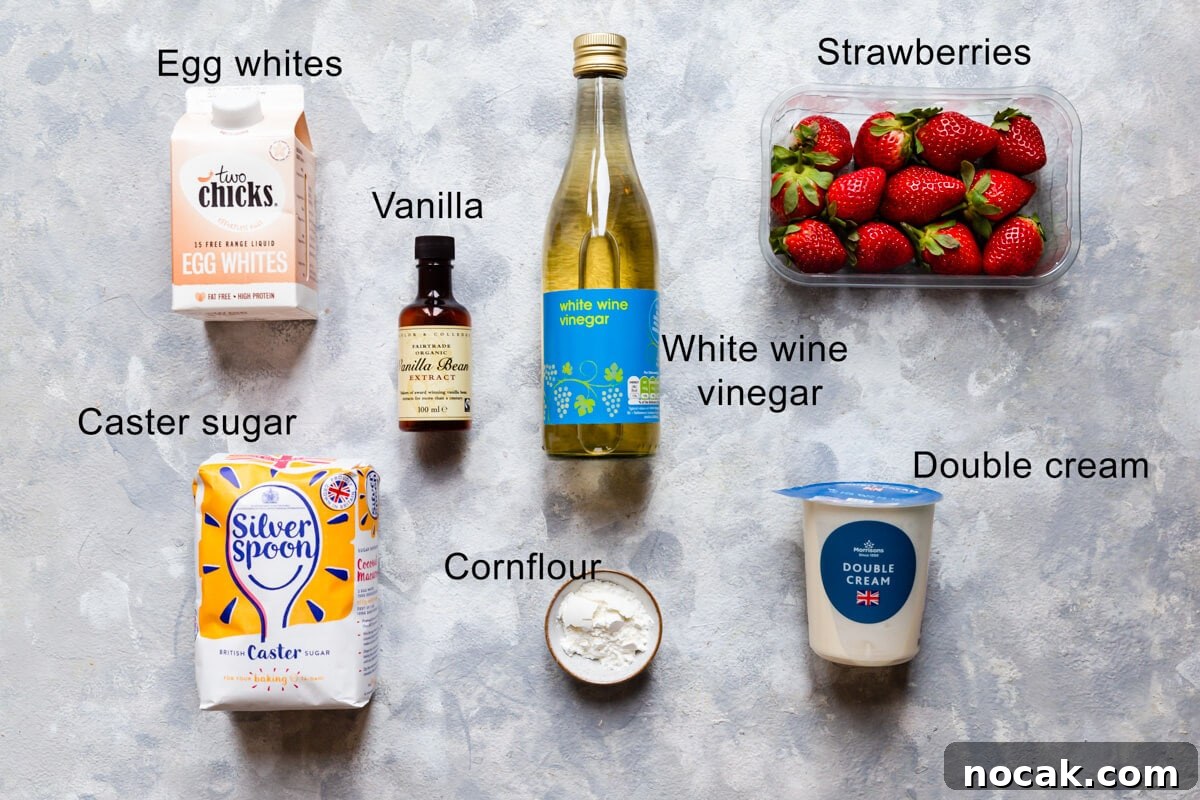 Strawberry Pavlova Recipe: Crisp Meringue with Fresh Berries 3 top view of the ingredients for strawberry pavlova with text labels