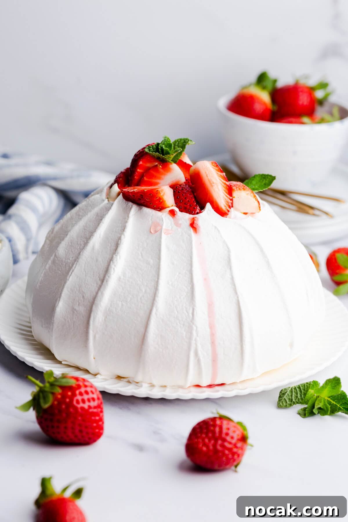 Strawberry Pavlova Recipe: Crisp Meringue with Fresh Berries 7 side close up at a strawberry pavlova
