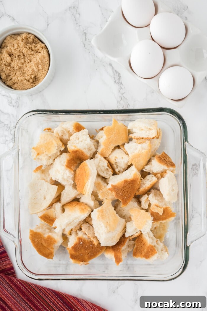 Cherry Bread Pudding Recipe with Fresh Cherry Sauce 3 Breaking apart the biscuits.