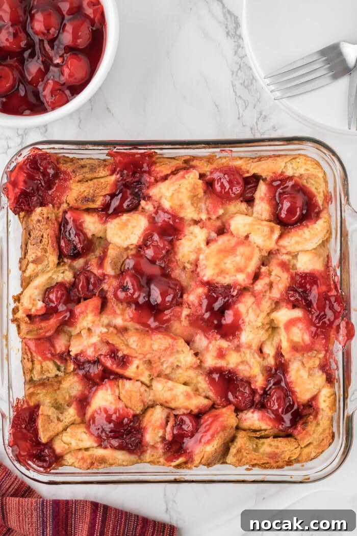 Cherry Bread Pudding Recipe with Fresh Cherry Sauce 6 The baked recipe in a dish.