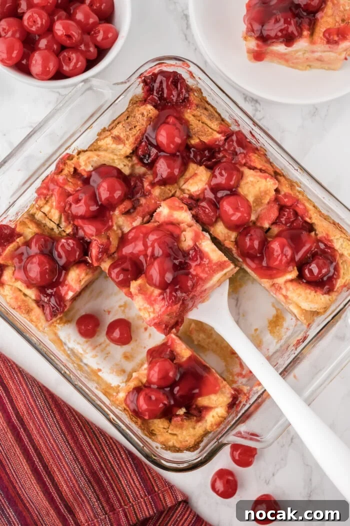 Cherry Bread Pudding Recipe with Fresh Cherry Sauce 7 Cherry Bread Pudding cut into squares.