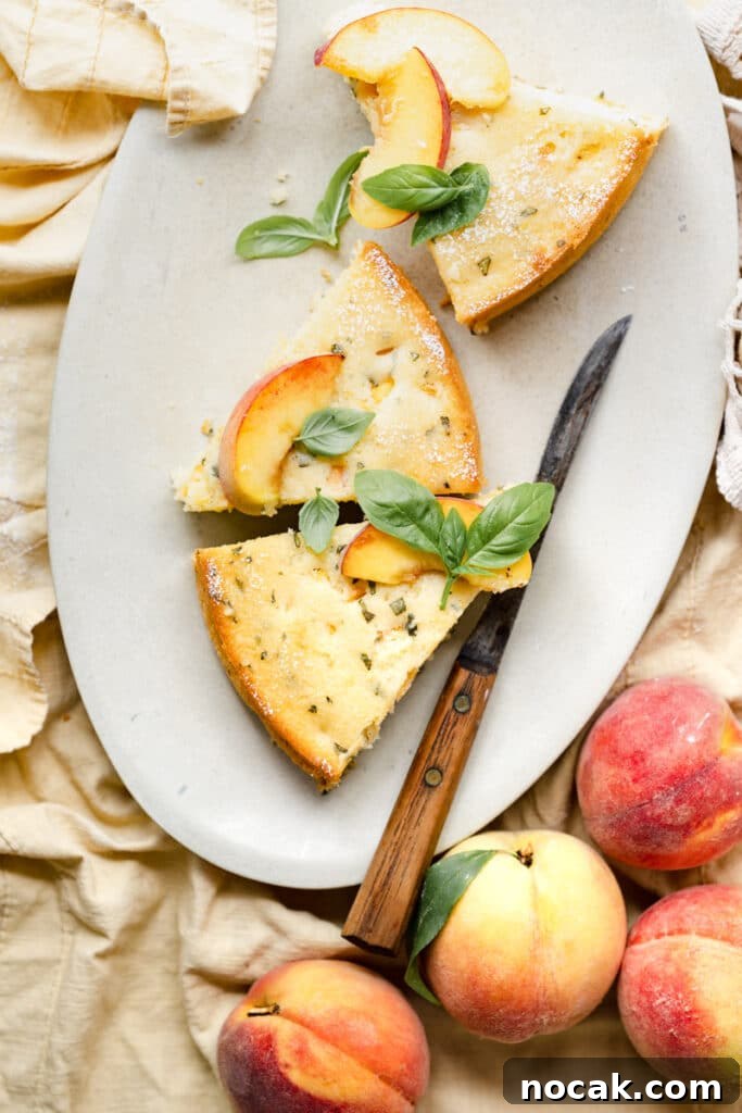 Basil Peach Ricotta Cake Recipe — Fresh Summer Dessert 4 Three slices of peach cake on oval platter with knife.