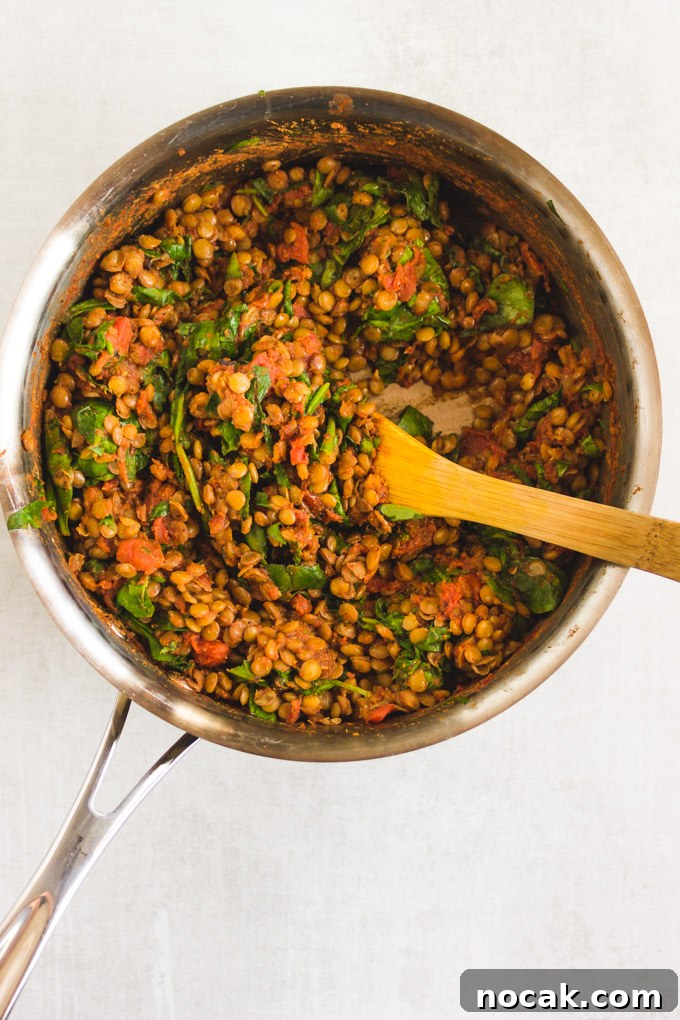Chipotle Lentil Sweet Potato Buddha Bowl - Packed with healthy ingredients that are bursting with flavor, lentil sweet potato buddha bowl is the perfect vegan entree any day of the week.  Only takes 40 minutes to make! #veganmeal #buddhabowl #glutenfreerecipe #lentils #weeknightdinner #dairyfree | RobustRecipes.com