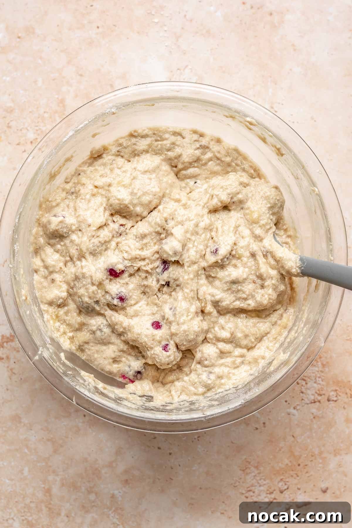 Cranberry Banana Bread Recipe with Zesty Orange Glaze 12 Finished cranberry banana bread batter in a bowl.