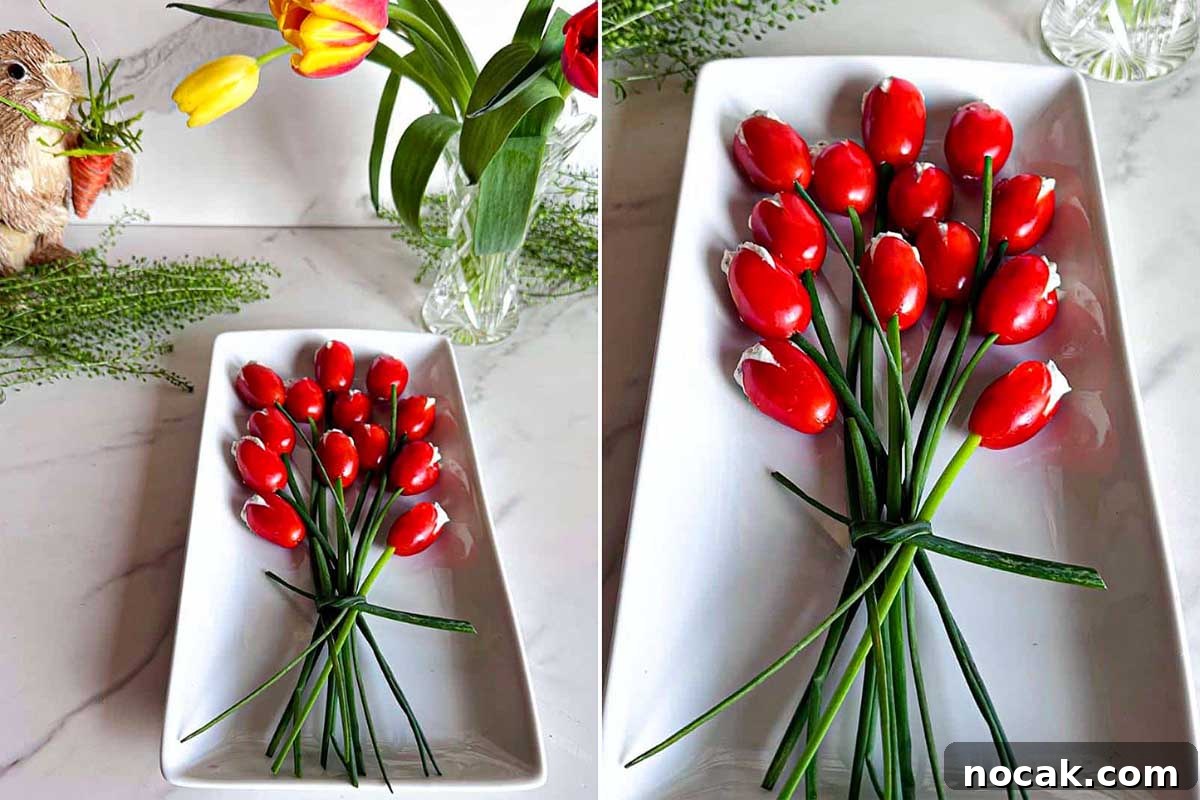 35 Easter Appetizers to Kick Off Your Holiday Feast 14 A creative Easter appetizer presentation of cherry tomatoes and chives arranged to resemble a bouquet of tulips on a white platter, alongside a floral arrangement with actual tulips.
