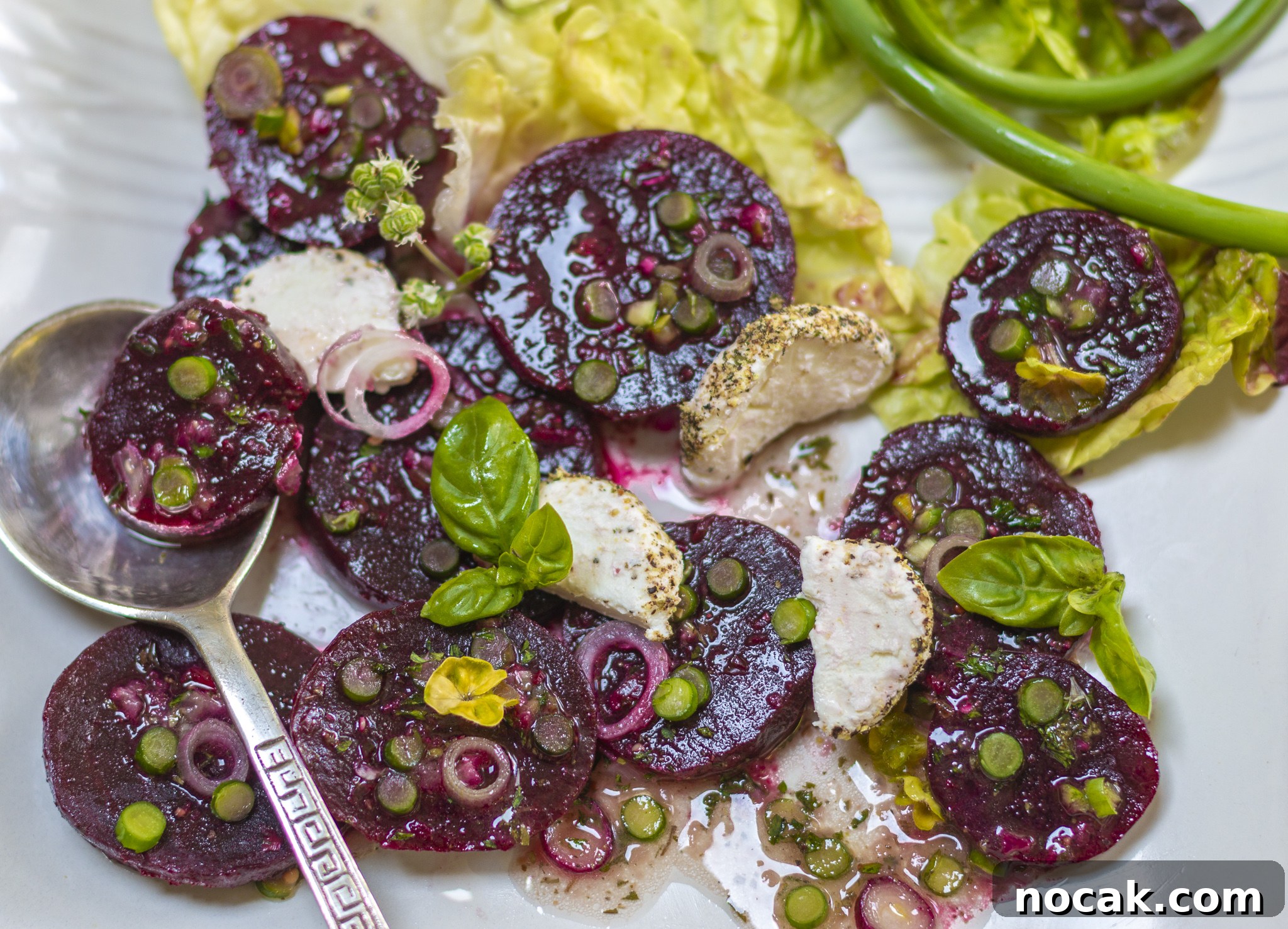 Tender Steamed Baby Beets in Garlic-Scape Vinaigrette 2 Beet salad with peppe red goat cheese