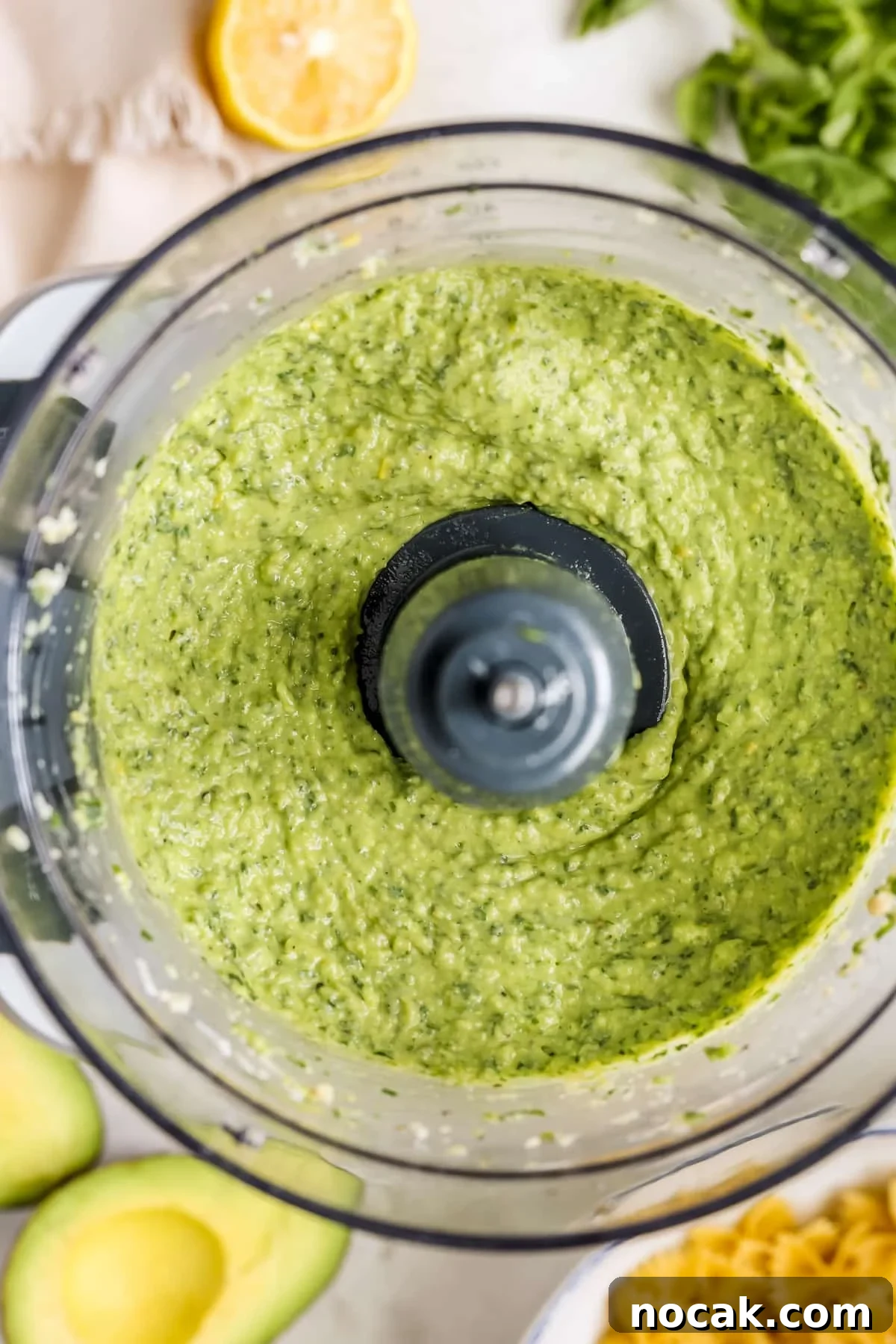 Creamy Avocado Pesto Pasta Recipe for Quick Weeknight Meals 5 pesto blended up in a food processor.
