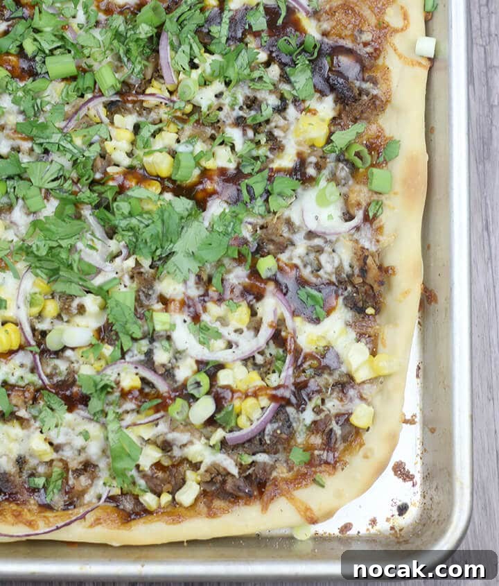 BBQ pork pizza with roasted corn and jalapeno