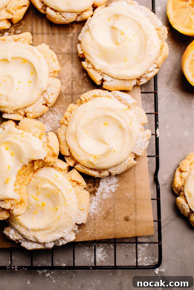 Soft Chewy Lemon Sugar Cookies Recipe for Perfect Texture 12 lemon sugar cookies with buttercream on cooling rack