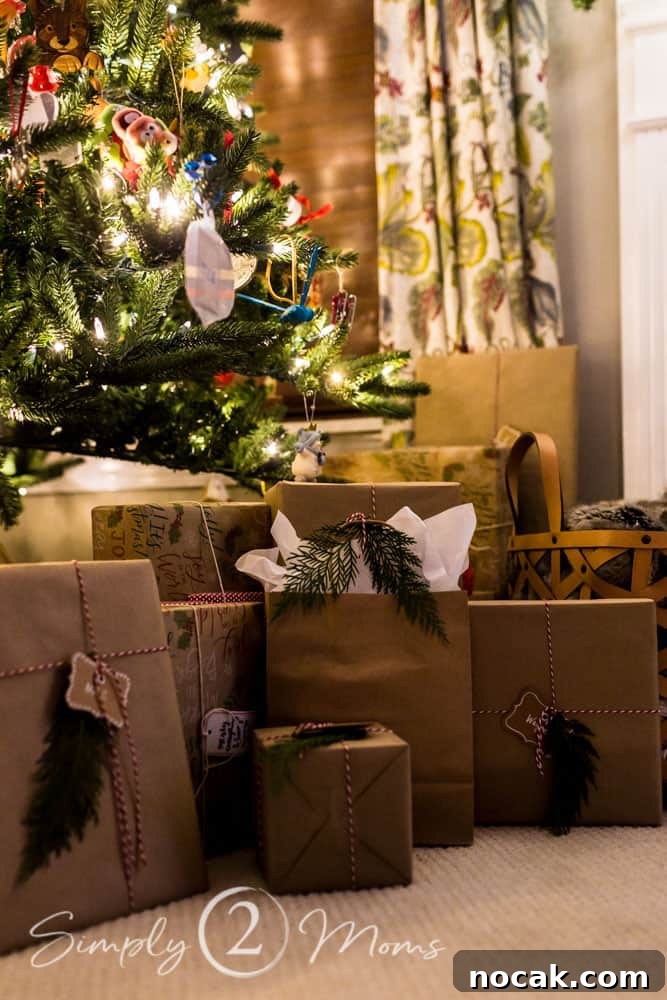 gifts wrapped with brown paper and twine accented with fresh cypress