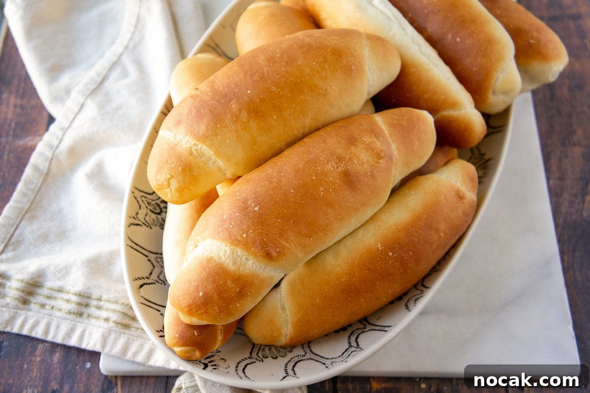 Soft Homemade Hot Dog Buns Recipe for Perfect Sandwiches 2 a bowl of homemade hot dog buns on a towel