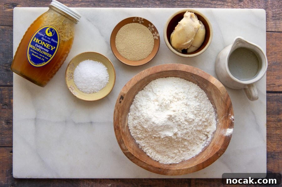 Soft Homemade Hot Dog Buns Recipe for Perfect Sandwiches 3 Ingredients to make hot dog buns including rendered bacon fat, flour, salt, yeast, and water