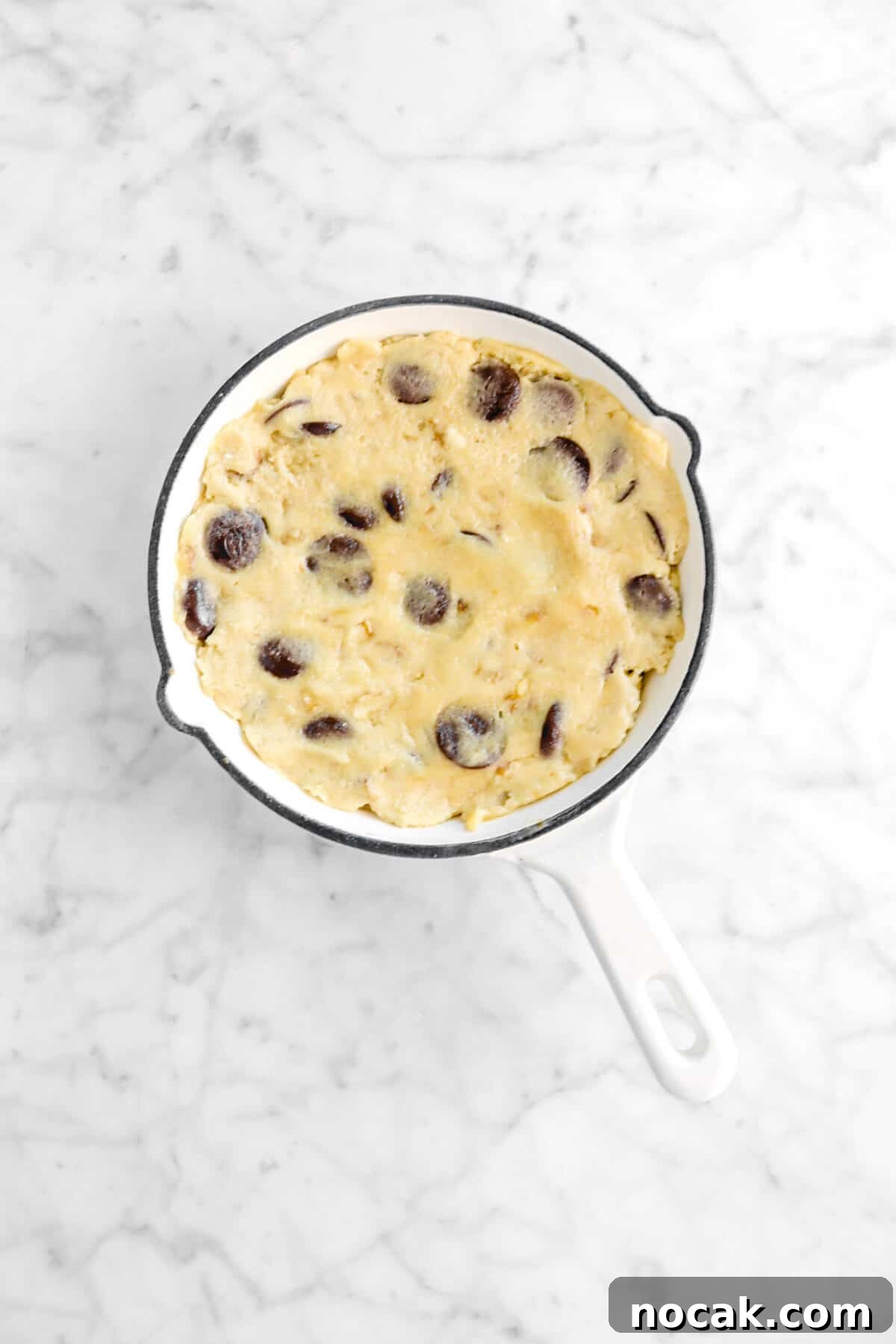 cookie dough in small white skillet