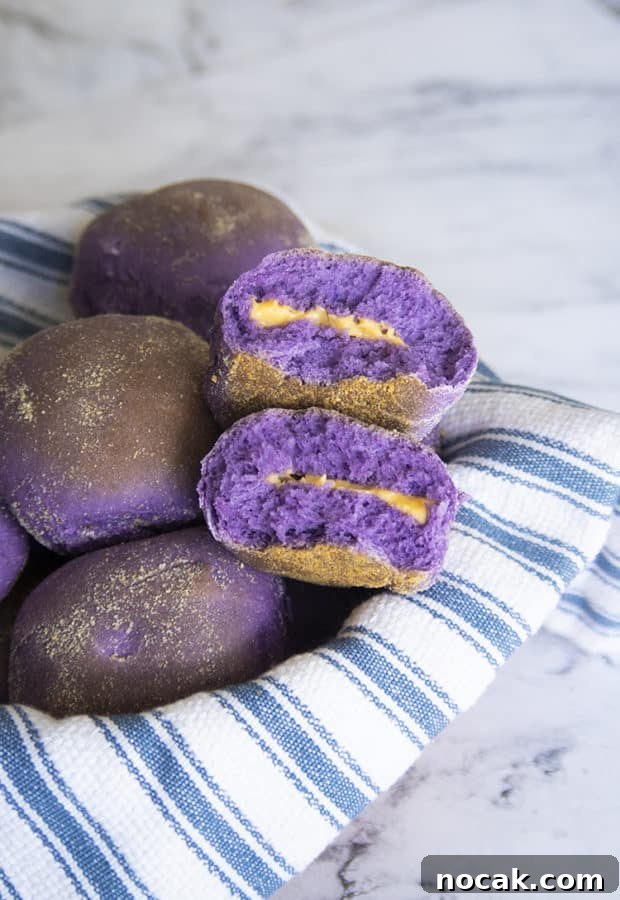 Soft, fluffy and surprisingly easy to make Ube Pandesal. I will show you how to make it, with this easy to understand recipe instructions.