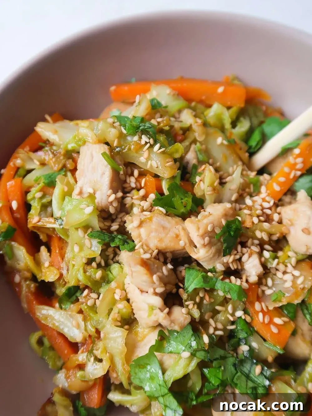 Chicken Egg Roll Bowl: Flavorful Low-Carb Stir-Fry Bowl 7 You are going to want to eat this healthy egg roll in a bowl every single day! This deconstructed version of an egg roll is made with chicken and is the perfect low-carb high-protein one-pan dinner recipe. Ready in about 20 minutes, this chicken egg roll in a bowl recipe is easy to make, pretty cheap, dairy- and gluten-free.