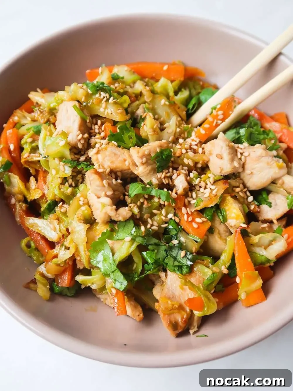 Chicken Egg Roll Bowl: Flavorful Low-Carb Stir-Fry Bowl 3 You are going to want to eat this healthy egg roll in a bowl every single day! This deconstructed version of an egg roll is made with chicken and is the perfect low-carb high-protein one-pan dinner recipe. Ready in about 20 minutes, this chicken egg roll in a bowl recipe is easy to make, pretty cheap, dairy- and gluten-free.