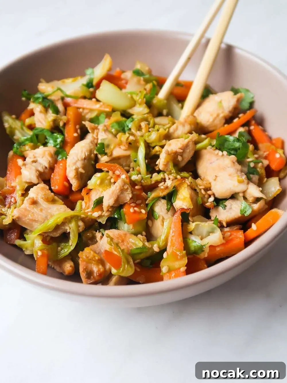 Chicken Egg Roll Bowl: Flavorful Low-Carb Stir-Fry Bowl 5 You are going to want to eat this healthy egg roll in a bowl every single day! This deconstructed version of an egg roll is made with chicken and is the perfect low-carb high-protein one-pan dinner recipe. Ready in about 20 minutes, this chicken egg roll in a bowl recipe is easy to make, pretty cheap, dairy- and gluten-free.