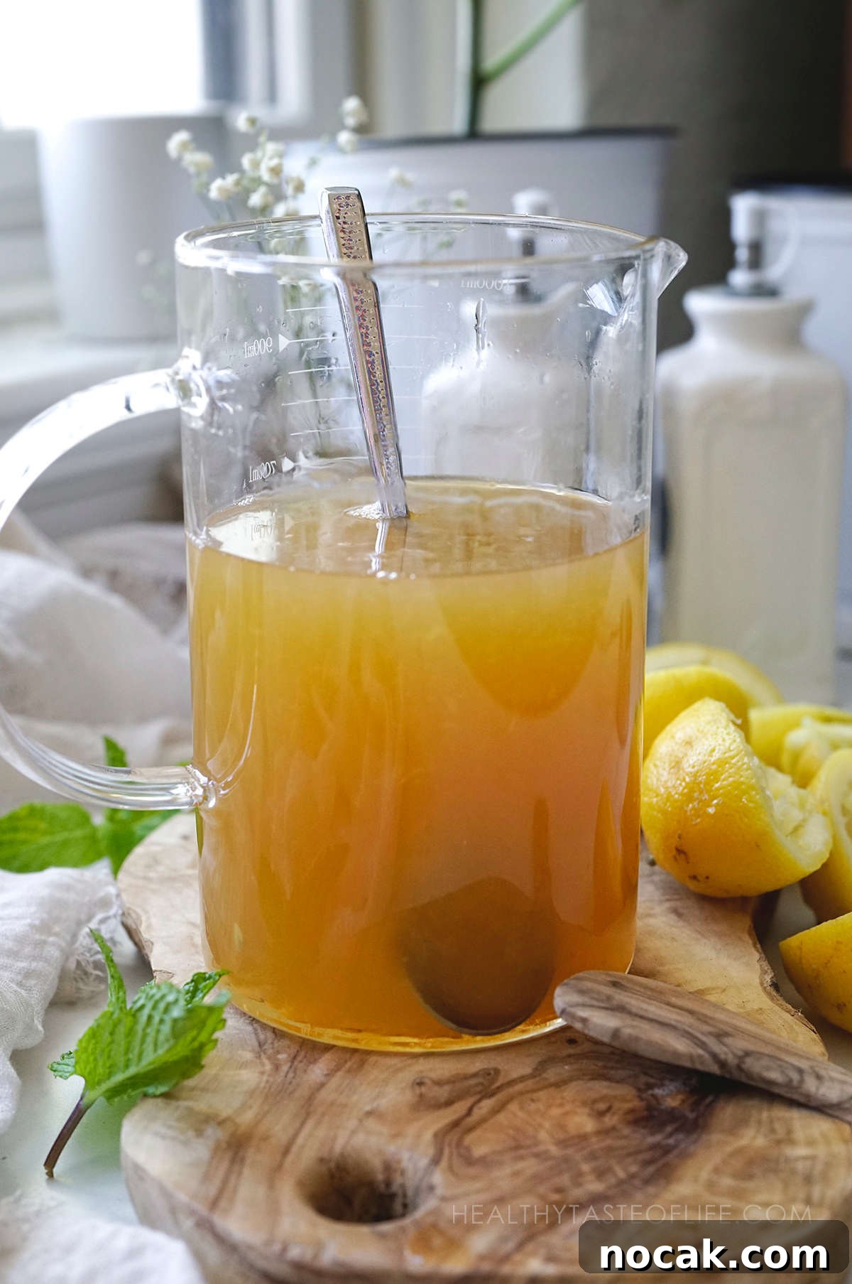 Refreshing Green Tea Lemonade with Fresh Lemon and Mint 6 Mixed green tea lemonade ready to be stored in the fridge.