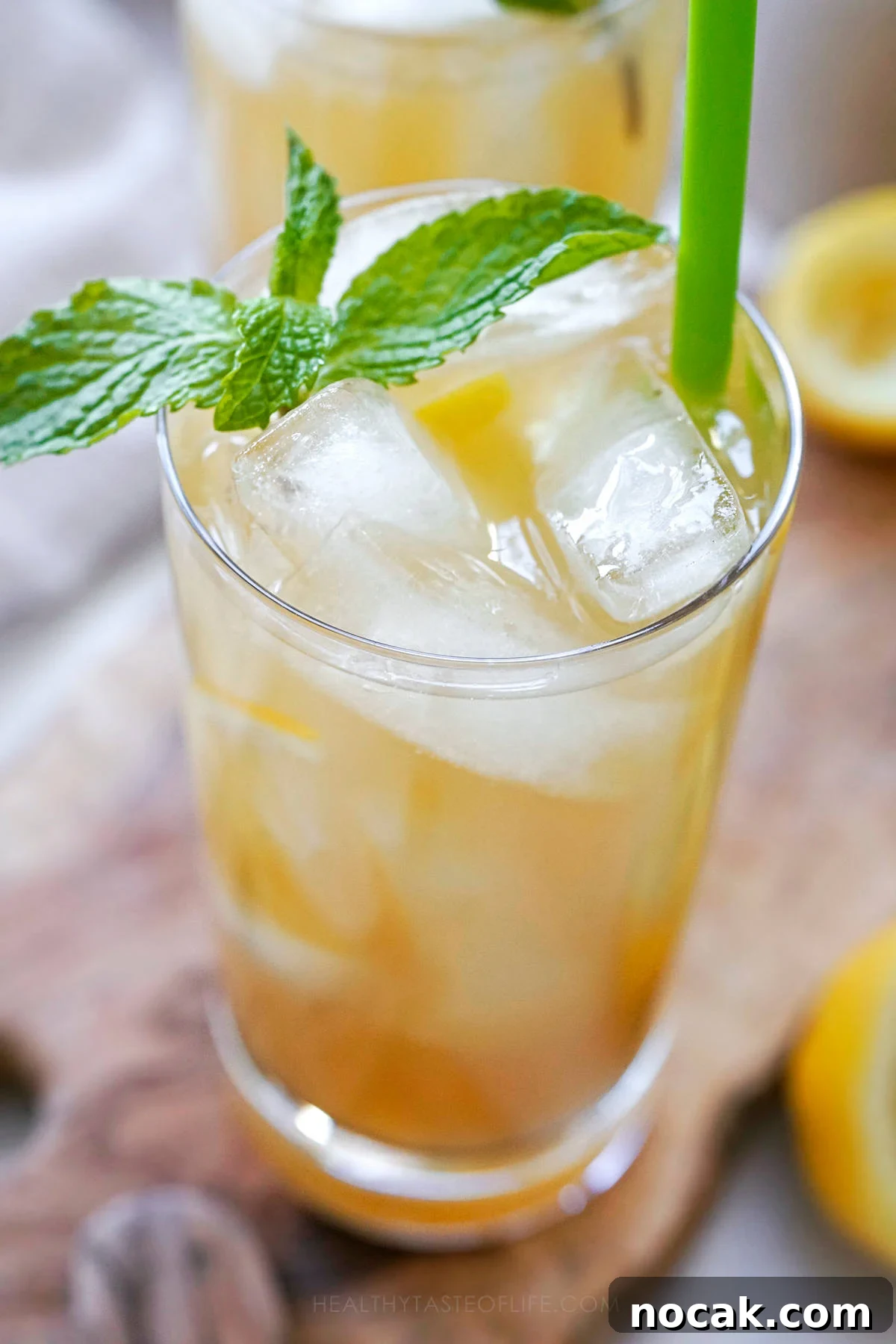 Refreshing Green Tea Lemonade with Fresh Lemon and Mint 9 Close up shot of iced green tea lemonade.