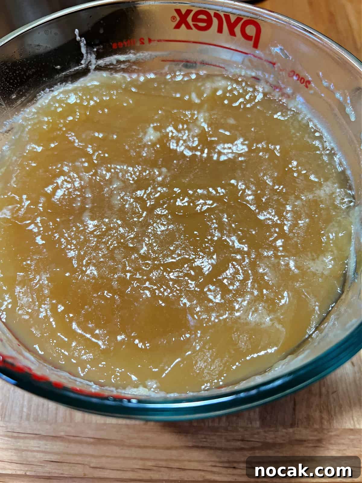 cold bone broth showing gelatin-like texture.