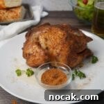 Juicy Smoked Whole Chicken Recipe for Tender, Flavorful Results 10 Whole chicken with seasonings on platter