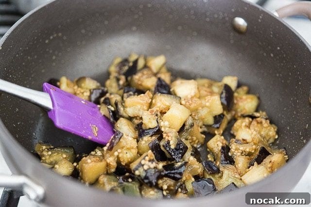 Cooked Eggplant Cubes in a Pan