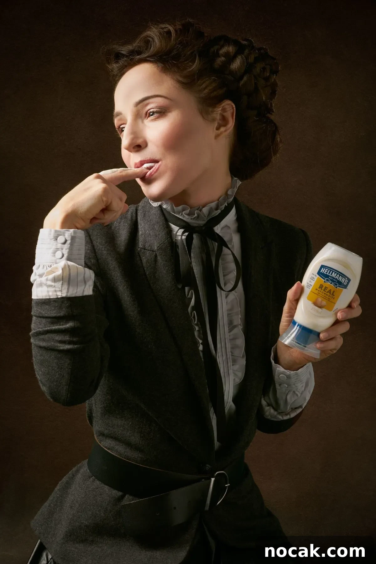 Is Mayonnaise Dairy-Free? What’s Actually in Your Mayo 2 Lady holding a container of mayo.
