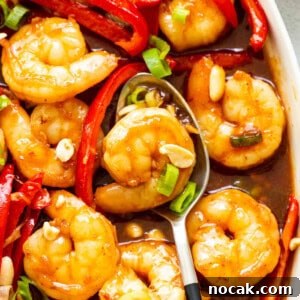 Authentic Kung Pao Shrimp Recipe with Crispy Peanuts and Chili 2 kung pao shrimp in bowl.