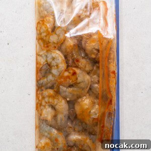 Authentic Kung Pao Shrimp Recipe with Crispy Peanuts and Chili 3 shrimp in bag with marinade.
