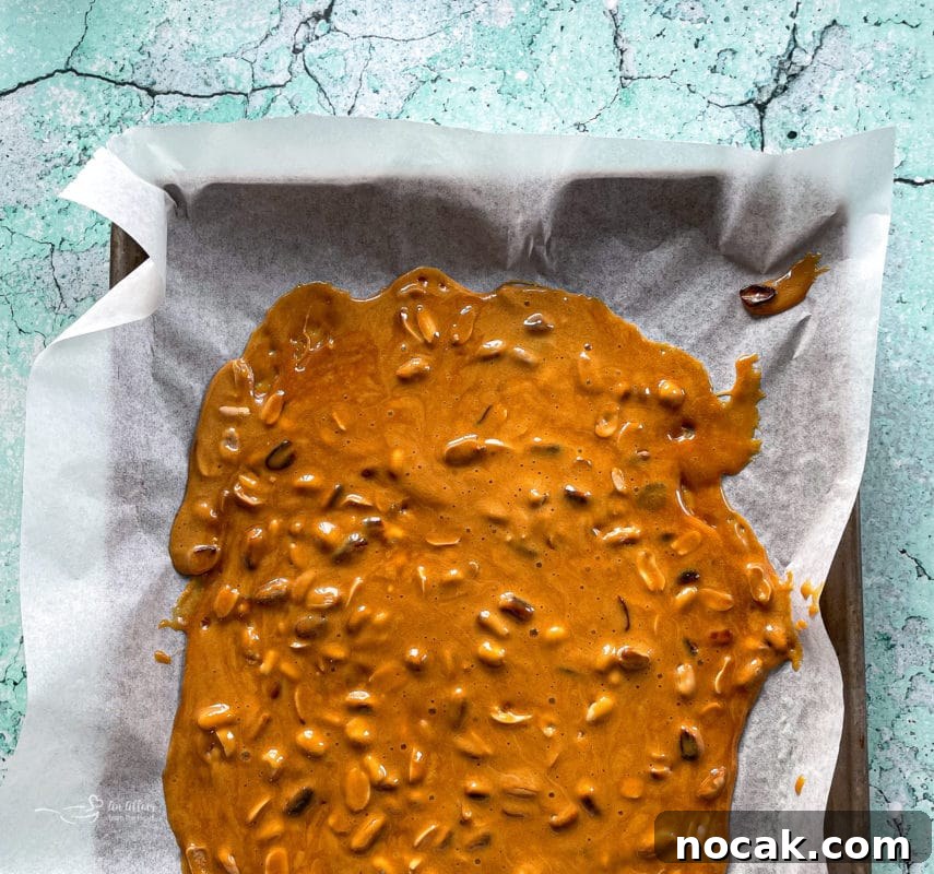 Classic Crunchy Peanut Brittle Recipe for Homemade Candy 7 pour hot peanut brittle mix
