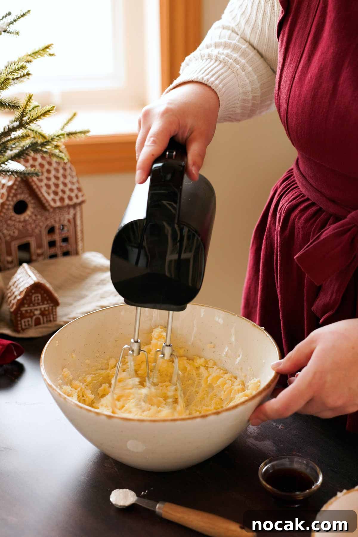Oreshki Walnut Cookies Recipe — Russian Fillable Pastry Treats 5 creaming butter and sugar in a large bowl with a handheld mixer