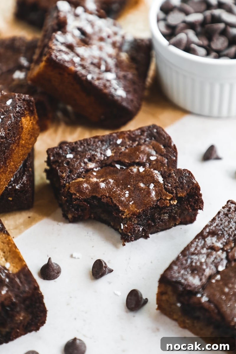 Browned Butter Blondies with Fudgy Brownie Swirls 6 Browned butter brownie blondies with a bite and chocolate chips.