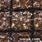 Browned Butter Blondies with Fudgy Brownie Swirls 7 Closeup of browned butter blondie brownies with flaky sea salt.