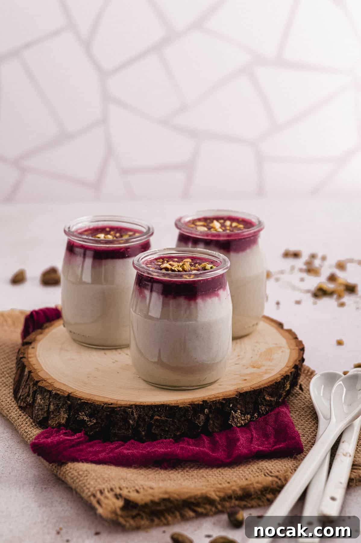 Malabi Rose Water Milk Pudding with Vegan Options 7 3 jars with malabi topped with raspberry syrup