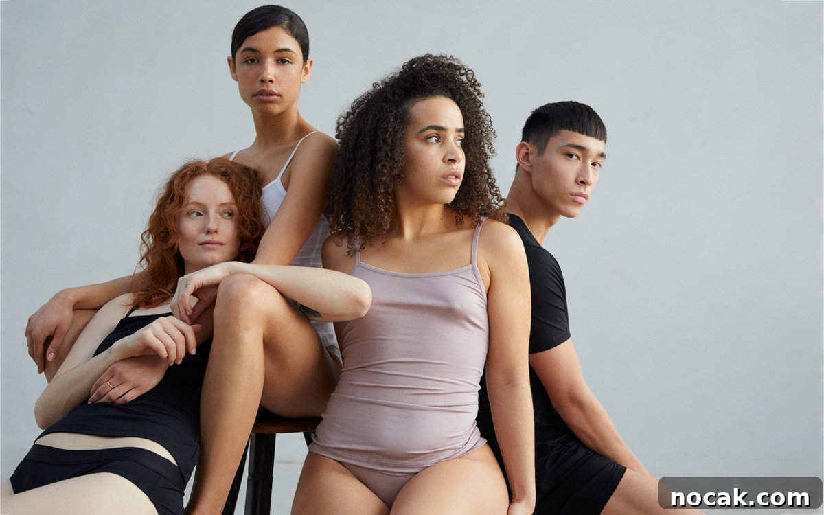 35 Ethical and Sustainable Loungewear Brands to Shop in 2024 15 Three women and a man wearing tank tops and boy shorts in different colours.