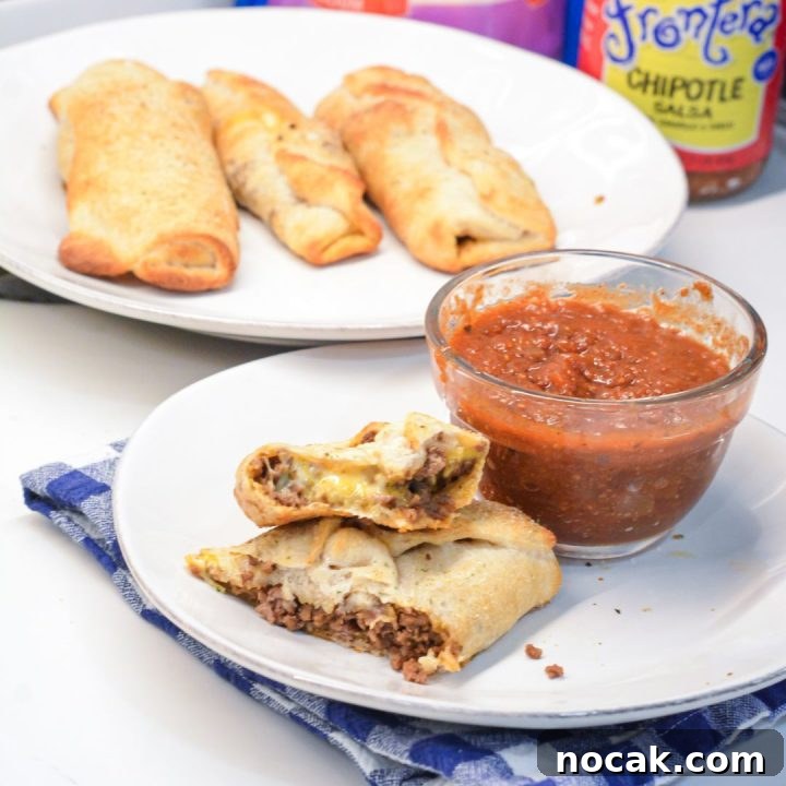 Crispy Taco Sticks Recipe: Flavorful Party Appetizers 10 Taco sticks are made by wrapping taco meat and a colby-jack cheese stick in pizza dough then baking for 10 minutes for an easy weeknight meal recipe.