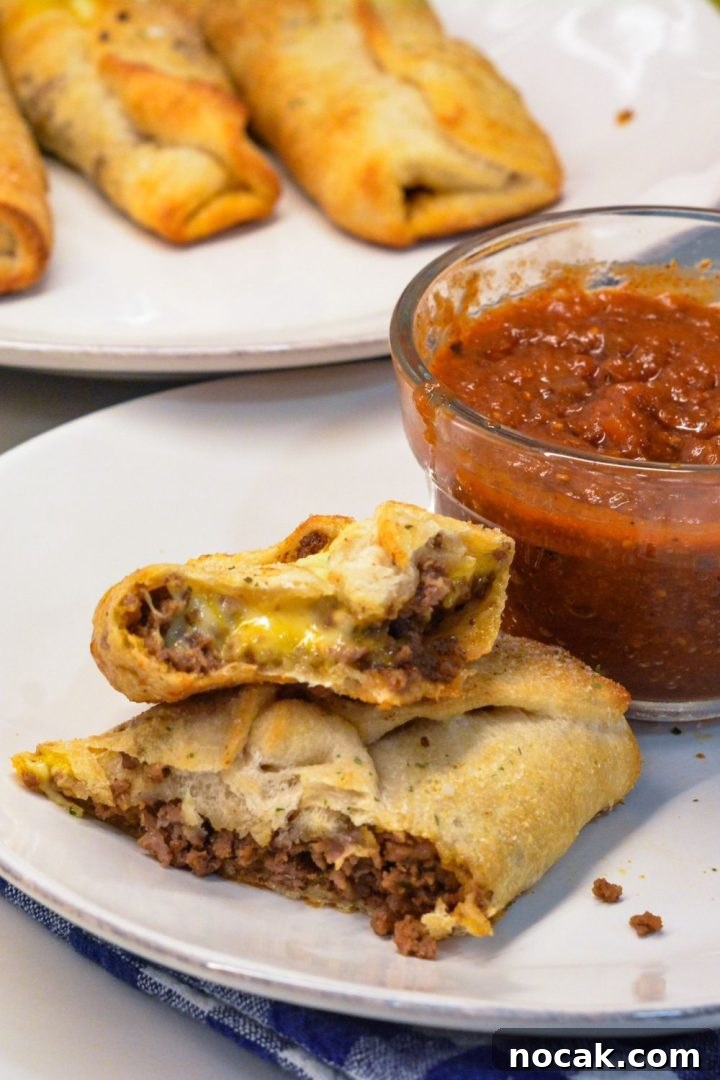 Crispy Taco Sticks Recipe: Flavorful Party Appetizers 11 Taco sticks are made by wrapping taco meat and a colby-jack cheese stick in pizza dough then baking for 10 minutes for an easy weeknight meal recipe.
