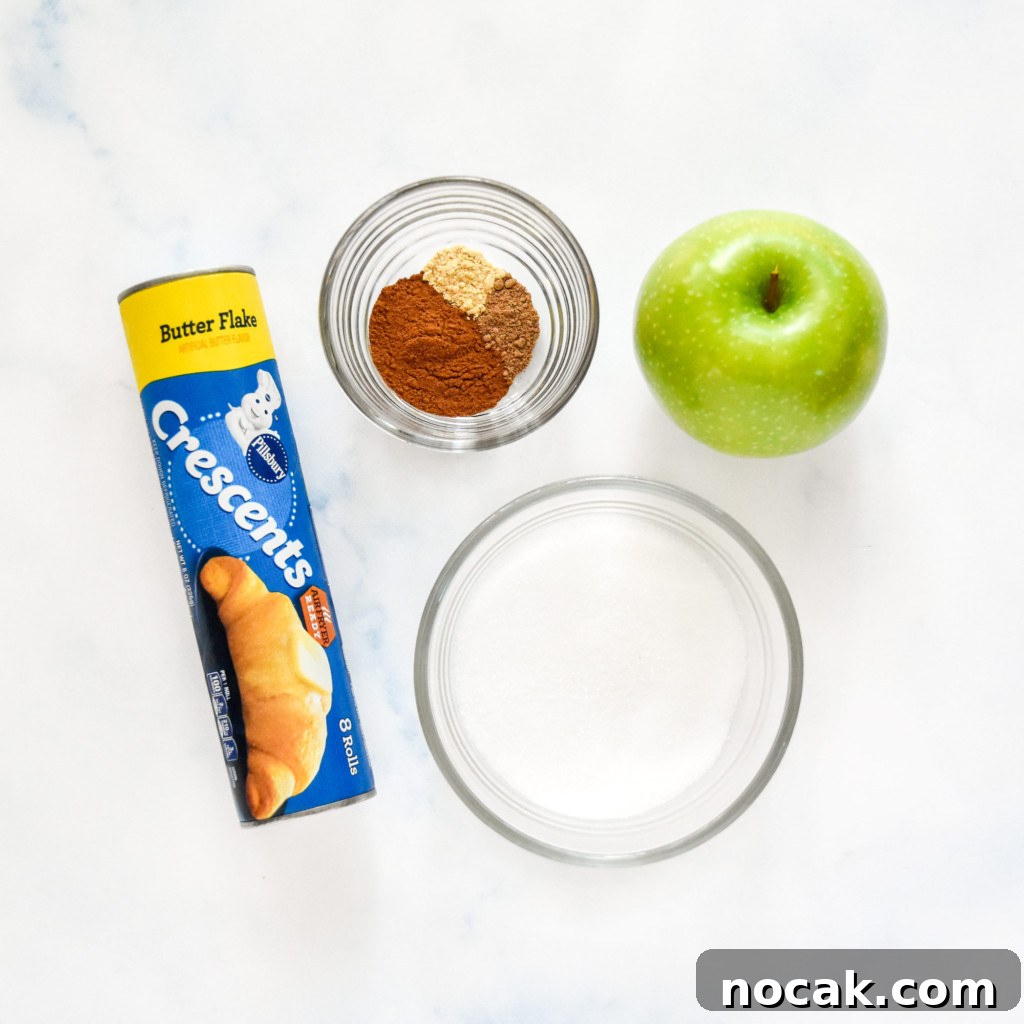 Air Fryer Apple Pie Crescent Rolls Recipe 3 ingredients laid out on a counter to make the air fryer apple pie crescent rolls.