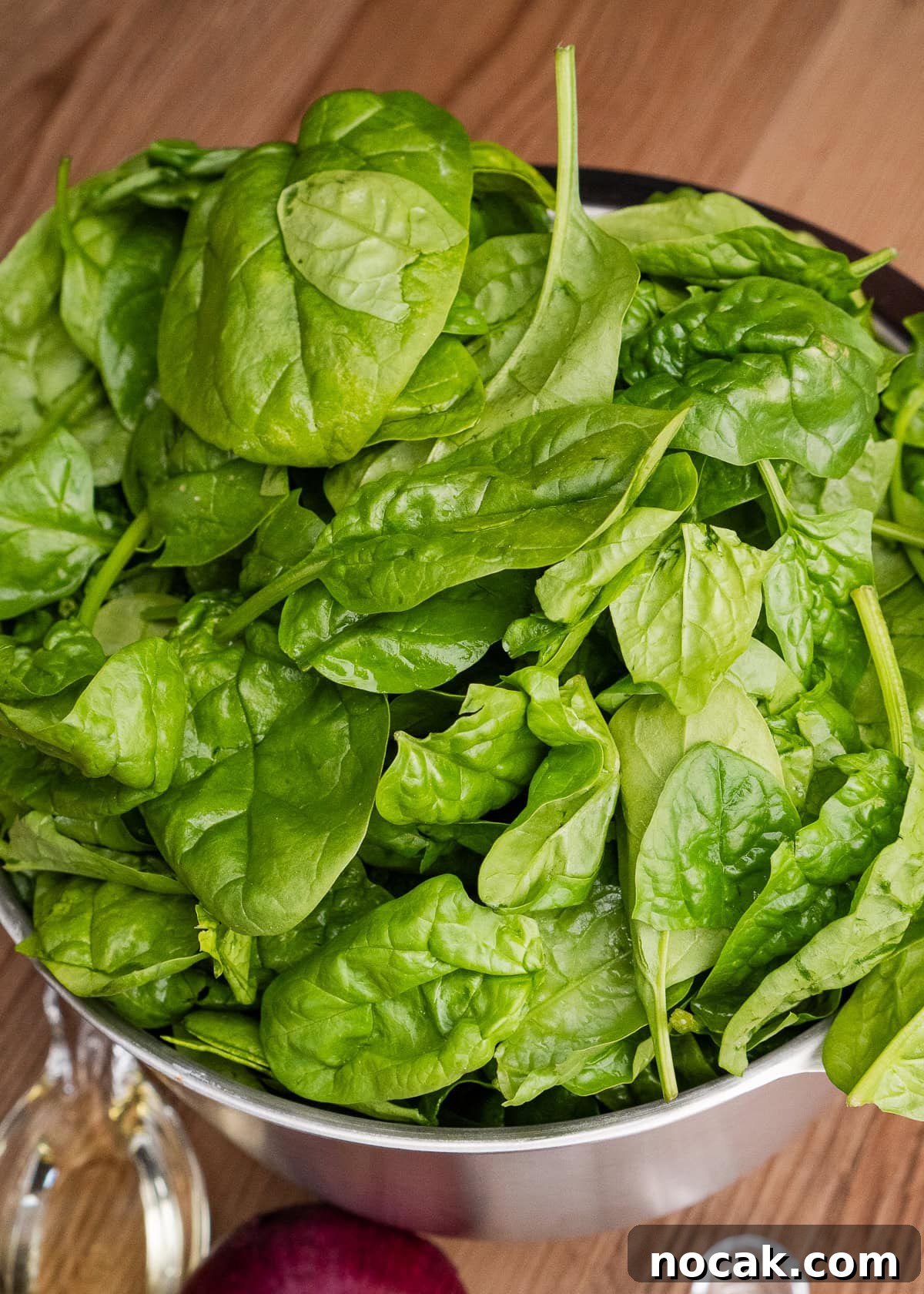Saag Bhaji Recipe: Creamy Indian Spinach Curry with Spices 14 Spinach in a bowl