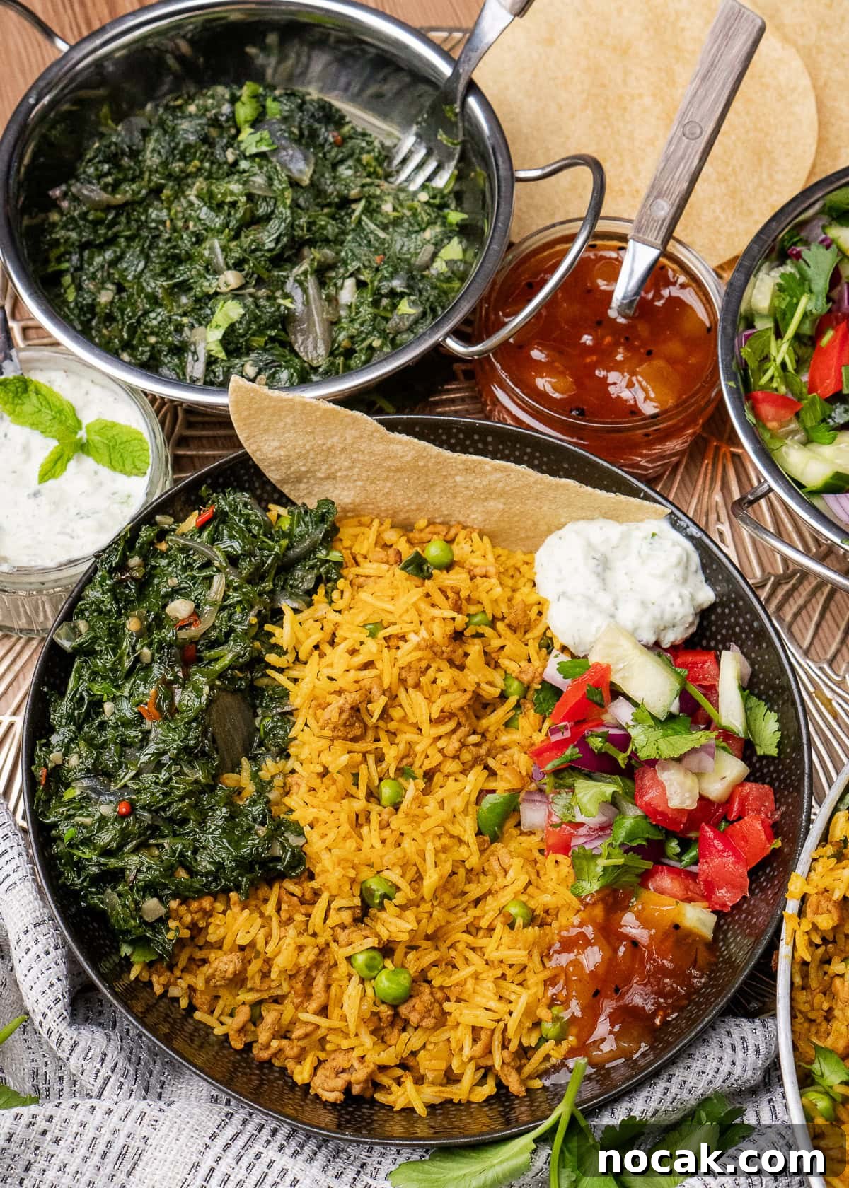 Saag Bhaji Recipe: Creamy Indian Spinach Curry with Spices 21 Indian spinach Side Dish served with keema rice, onion salad, mango chutney and mint raita