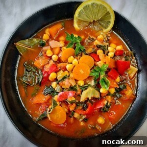 21 Flavorful Low-Sodium Soup Recipes for Heart-Friendly Meals 3 Garbanzo Bean Soup in Black Bowl