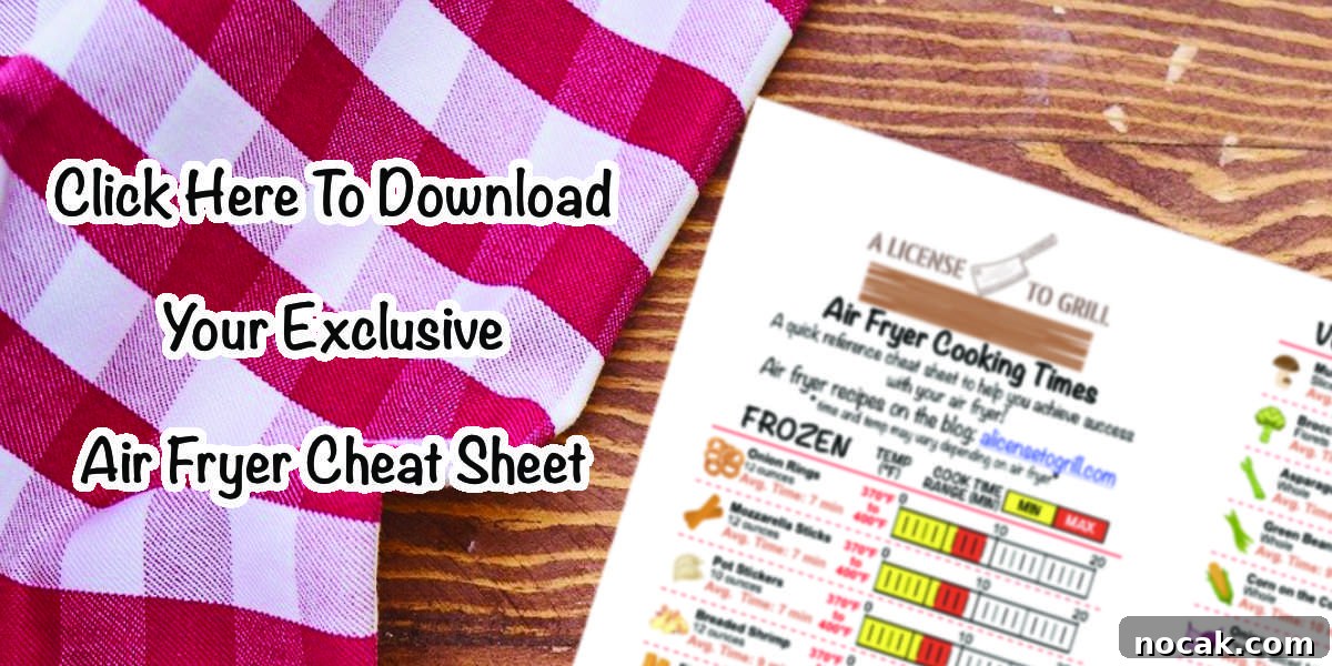 Crispy Air Fryer Corn Dogs Recipe (Homemade) 3 air fryer cheat sheet preview sitting on wood desk with text "click here to download your exclusive air fryer cheat sheet"